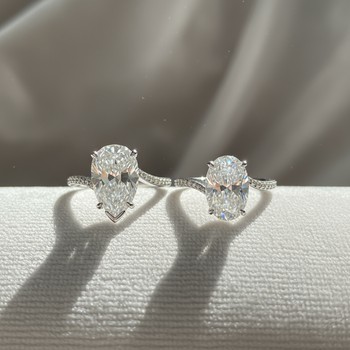 Toi et Moi ring pairing pear and oval stones