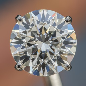 Round brilliant facets catching bright light