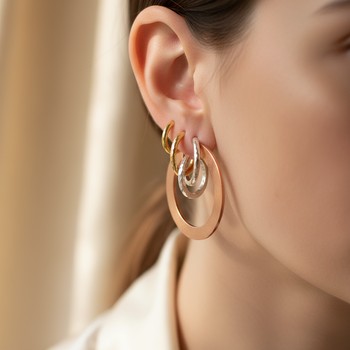 Layered hoops with a single charm