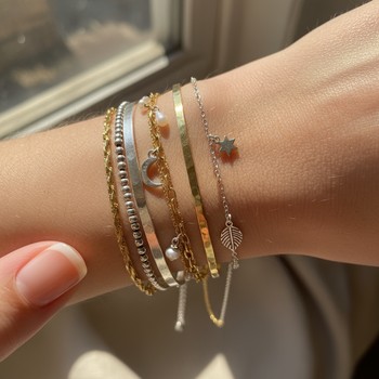 Bracelet stack of mixed metals and textures